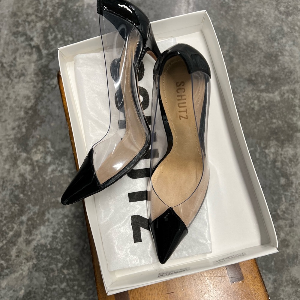 Schultz. Classy heels. Black & clear. Only used 2-3 times.
